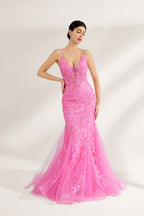A woman stands against a light background, wearing a pink tulle - and - lace mermaid gown. It has thin straps, a deep V - neckline, and intricate floral lace patterns. The flowing tulle skirt adds romance, combining elegance and charm, perfect for formal events like weddings or galas.3