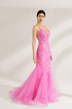 A woman stands against a light background, wearing a pink tulle - and - lace mermaid gown. It has thin straps, a deep V - neckline, and intricate floral lace patterns. The flowing tulle skirt adds romance, combining elegance and charm, perfect for formal events like weddings or galas.4