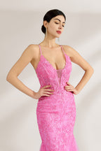 A woman stands against a light background, wearing a pink tulle - and - lace mermaid gown. It has thin straps, a deep V - neckline, and intricate floral lace patterns. The flowing tulle skirt adds romance, combining elegance and charm, perfect for formal events like weddings or galas.5