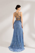 Bathed in soft light, a woman stuns in a blue mermaid - cut gown. It has thin criss - cross straps, a deep V - neckline, and is covered with intricate sequin embroidery, plus a high side slit. The shimmering details lend an air of opulence, perfect for grand galas or red - carpet moments.2