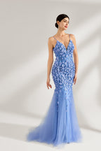 A woman stands against a light background, wearing a light - blue tulle gown. It features thin straps, a deep V - neckline, intricate 3D floral appliqués with sequins on the bodice and skirt, and a mermaid silhouette with a trailing tulle skirt. The elegant design creates a romantic and glamorous look, perfect for formal events like proms or weddings.3