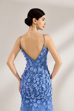 A woman stands against a light background, wearing a light - blue tulle gown. It features thin straps, a deep V - neckline, intricate 3D floral appliqués with sequins on the bodice and skirt, and a mermaid silhouette with a trailing tulle skirt. The elegant design creates a romantic and glamorous look, perfect for formal events like proms or weddings.6