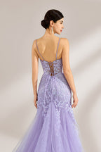 The model sports neatly arranged hair and dangles elegant long earrings. The gown is lavender, featuring a deep V - neckline and slender spaghetti straps. Intricate floral lace embellishes it, and the mermaid - cut skirt, crafted from airy tulle, exudes an elegant and dreamy charm, ideal for formal events.6