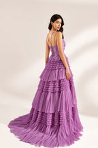 A woman stands against a light background, wearing a lavender tulle gown. It has thin straps, a deep V - neckline, and intricate floral lace embroidery on the bodice. The multi - layered, ruffled tulle skirt with a train creates a romantic and voluminous look, perfect for formal events like weddings or proms, exuding elegance and charm.
2
