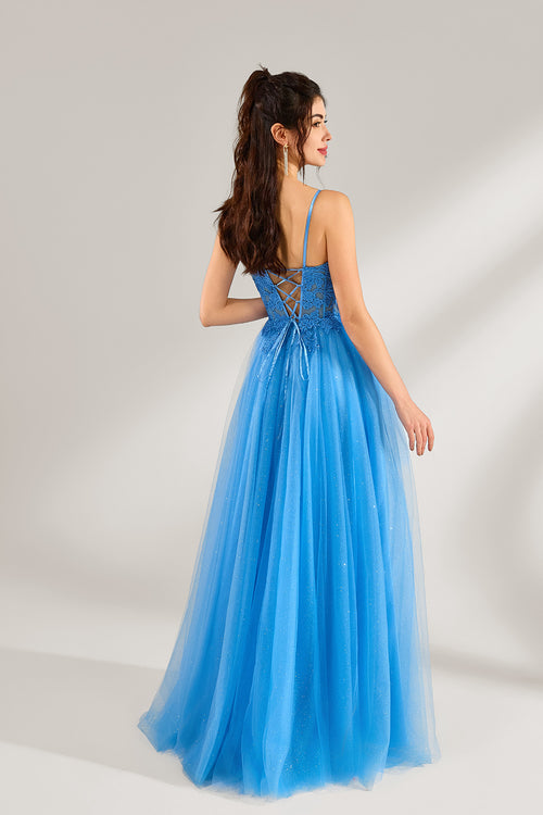 A woman stands against a light background, wearing a blue tulle gown. It features thin straps, a square neckline, intricate lace embroidery on the bodice, and a voluminous tulle skirt with subtle glitter. The elegant design creates a romantic and glamorous look, perfect for formal events like proms or weddings.2