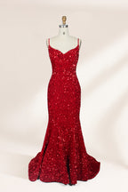 photograph of a mannequin wearing a red sequin evening gown, full-length, floor-length, sleeveless, V-neck, fitted bodice, flared skirt, glossy texture, elegant, glamorous, fashion, studio lighting, white background, soft shadows, high-end fashion, no accessories, no jewelry, no shoes, no face, no hair, no makeup, no background details, simple composition, focus on dress, no people, no textures, no patterns, no objects.01
