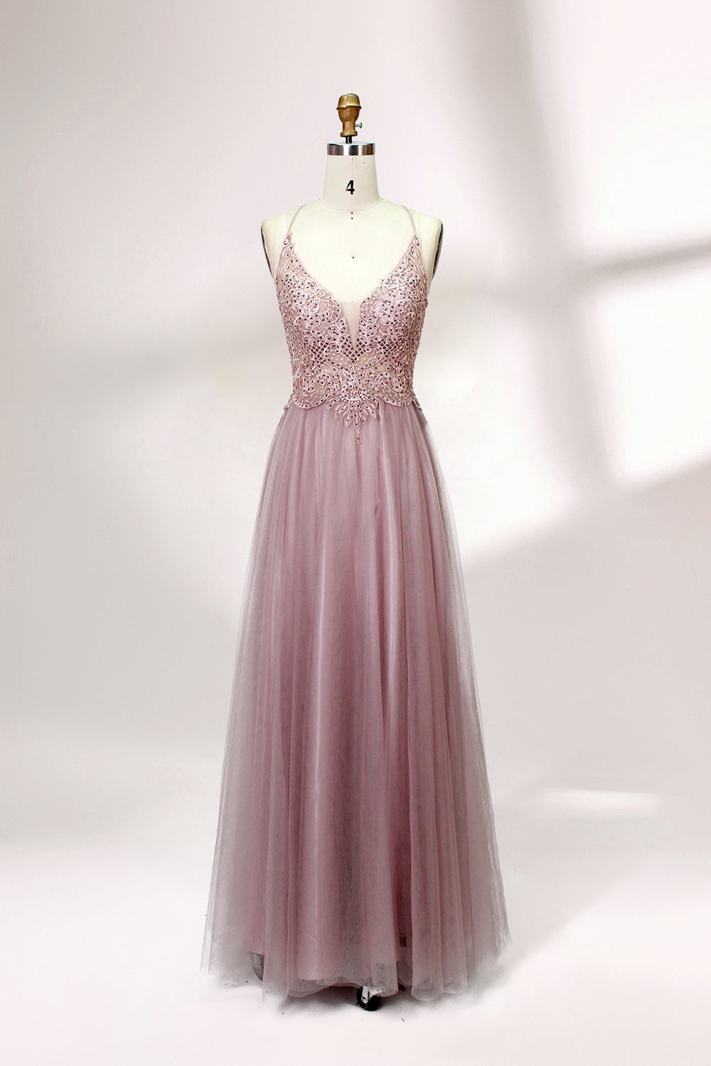 Blush pink tulle prom dress with beaded sheer bodice, V-neck, criss-cross back & flowing skirt. Elegant, dreamy design—perfect for bulk premium partywear stock.01