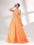 A woman stands against a light background, wearing an orange evening gown. It has thin spaghetti straps, a deep V - neckline, and is adorned with delicate floral - like sequin embroidery all over. The voluminous tulle skirt creates an elegant and glamorous look, perfect for formal events.1