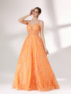 A woman stands against a light background, wearing an orange evening gown. It has thin spaghetti straps, a deep V - neckline, and is adorned with delicate floral - like sequin embroidery all over. The voluminous tulle skirt creates an elegant and glamorous look, perfect for formal events.1