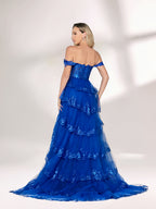 A woman stands against a light background, wearing a royal - blue tulle gown with sequin embellishments. It has an off - shoulder design, a sweetheart neckline, and a tiered skirt. The sparkling sequins and flowing fabric exude romance, perfect for formal events like weddings or galas.2