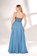A woman with long, wavy blonde hair and a graceful pose wears a light - blue chiffon gown. It has thin straps, a beaded and lace - detailed bodice, and a flowing, floor - length skirt. Paired with understated heels, the outfit exudes elegance, perfect for formal events like galas or weddings.02