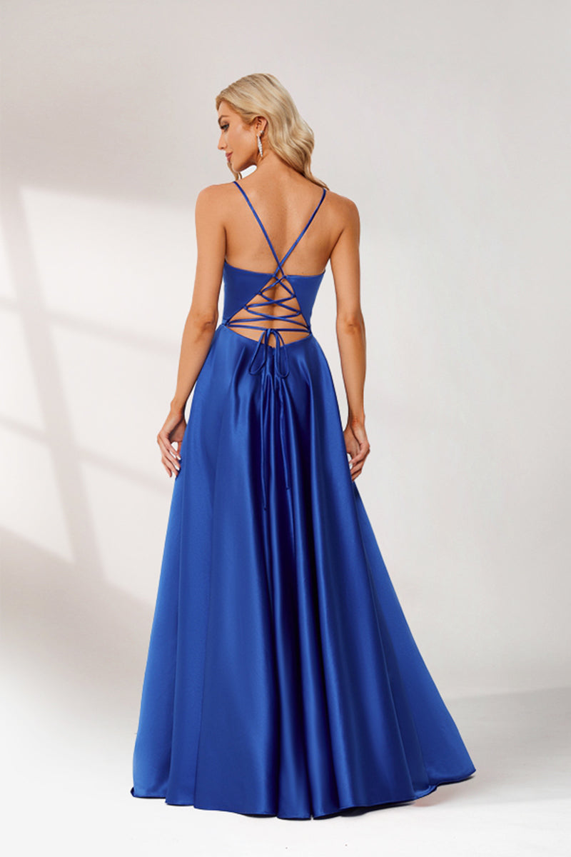 photograph, beautiful woman, long blonde hair, wavy hair, fair skin, blue satin gown, floor-length dress, V-neck, sleeveless, elegant, standing pose, white background, studio lighting, shadows on wall, confident expression, red lipstick, glamorous, high-fashion, evening wear, full body shot, no accessories, simple backdrop, clean lines, minimalistic, modern style, fashionable, chic, sophisticated, elegant, high-quality image, sharp details.32636-02