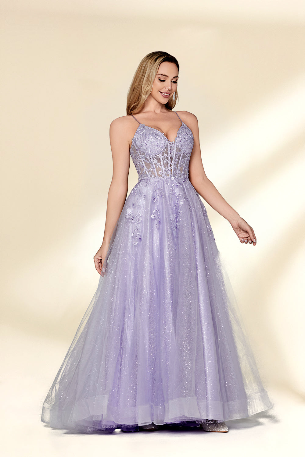 beautiful woman, standing, full-body shot, elegant, long blonde hair, light skin tone, smiling, wearing a sparkly lavender gown, fitted bodice, lace detailing, layered tulle skirt, holding hands, neutral background, studio lighting, soft shadows, formal wear, photograph, fashion, glamorous, high-quality image, dress has a sweetheart neckline, dress has spaghetti straps, dress has a high slit, dress has a train.32814-04