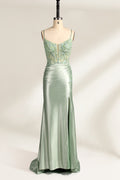 photograph of elegant floor-length evening gown, pastel mint green color, lace bodice with intricate floral patterns, fitted bodice with sweetheart neckline, high slit on right side, smooth satin fabric, model mannequin with neutral expression, studio setting, soft natural lighting, beige background, fashion photography, no accessories, focus on dress details, no people, simple and classy, high-end fashion, luxury, sophistication.33020-01