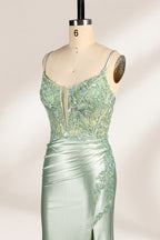 photograph of elegant floor-length evening gown, pastel mint green color, lace bodice with intricate floral patterns, fitted bodice with sweetheart neckline, high slit on right side, smooth satin fabric, model mannequin with neutral expression, studio setting, soft natural lighting, beige background, fashion photography, no accessories, focus on dress details, no people, simple and classy, high-end fashion, luxury, sophistication.33020-02