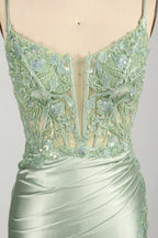 photograph of elegant floor-length evening gown, pastel mint green color, lace bodice with intricate floral patterns, fitted bodice with sweetheart neckline, high slit on right side, smooth satin fabric, model mannequin with neutral expression, studio setting, soft natural lighting, beige background, fashion photography, no accessories, focus on dress details, no people, simple and classy, high-end fashion, luxury, sophistication.33020-03