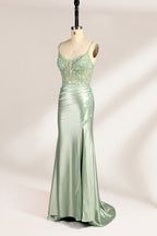 photograph of elegant floor-length evening gown, pastel mint green color, lace bodice with intricate floral patterns, fitted bodice with sweetheart neckline, high slit on right side, smooth satin fabric, model mannequin with neutral expression, studio setting, soft natural lighting, beige background, fashion photography, no accessories, focus on dress details, no people, simple and classy, high-end fashion, luxury, sophistication.33020-04