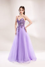 photograph of a young woman wearing a beautiful, floor-length, lavender ball gown with intricate sequin detailing on the bodice, sheer tulle skirt, spaghetti straps, long brown hair, fair skin, standing in a soft lit studio, neutral background, elegant, sophisticated, dreamy, fashion, glamour, full body shot, high quality, fashion photography, stylish, feminine, graceful, classy, modern, delicate, light, airy.33040-04