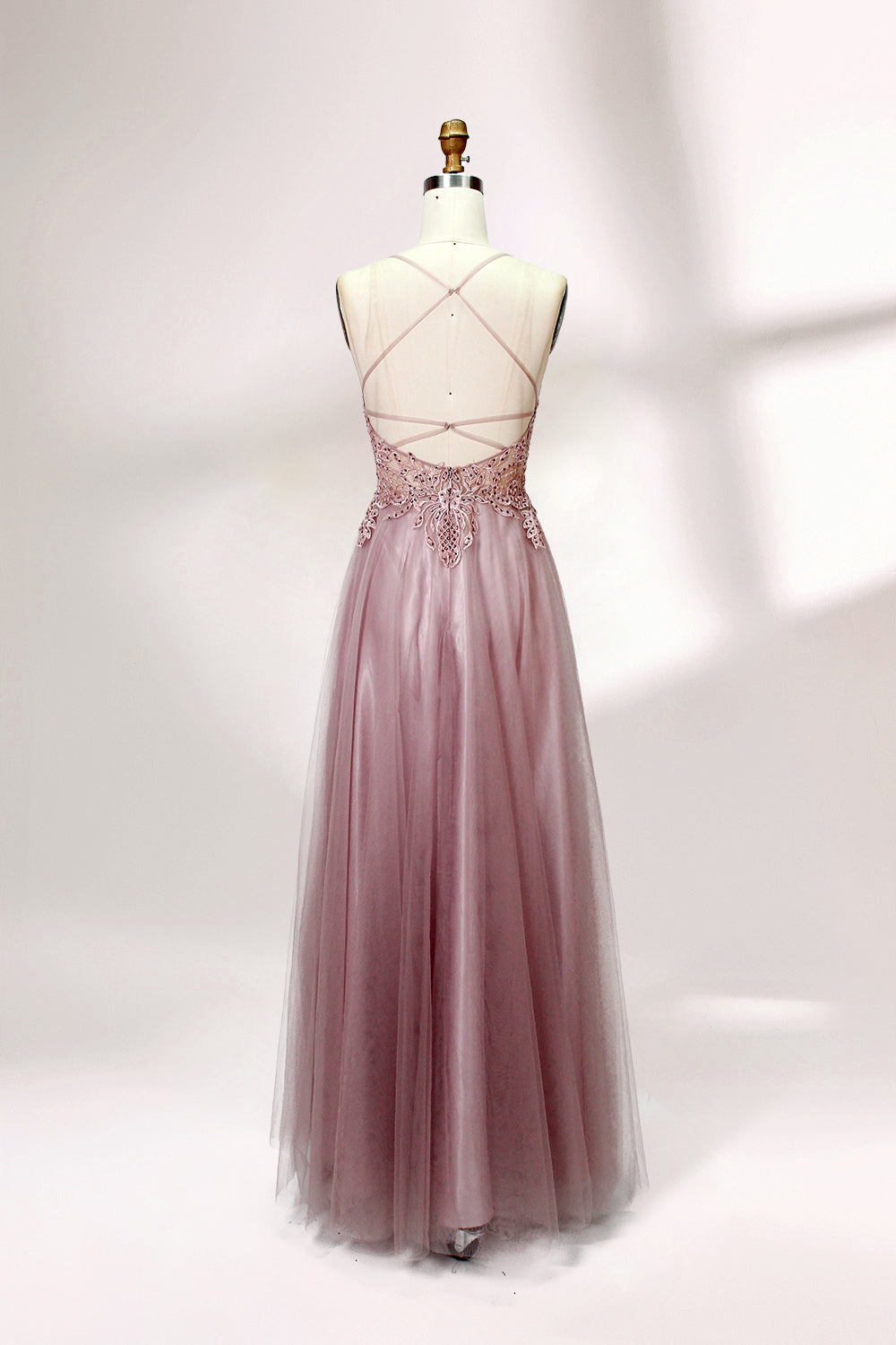 Blush pink tulle prom dress with beaded sheer bodice, V-neck, criss-cross back & flowing skirt. Elegant, dreamy design—perfect for bulk premium partywear stock.02