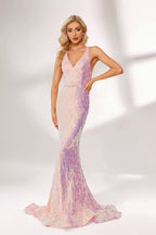 A woman stands against a light background, wearing a pink - purple ombre sequin gown. It features a deep V - neckline, a mermaid silhouette, and a low back. The shimmering sequins create a glamorous effect, perfect for formal events like galas or proms, exuding elegance and charm.1