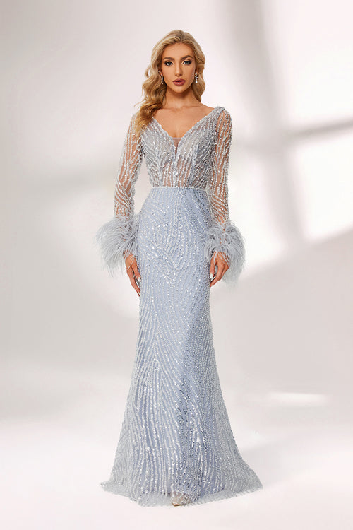 Light blue sequin mermaid gown with long sleeves and feather cuff trim