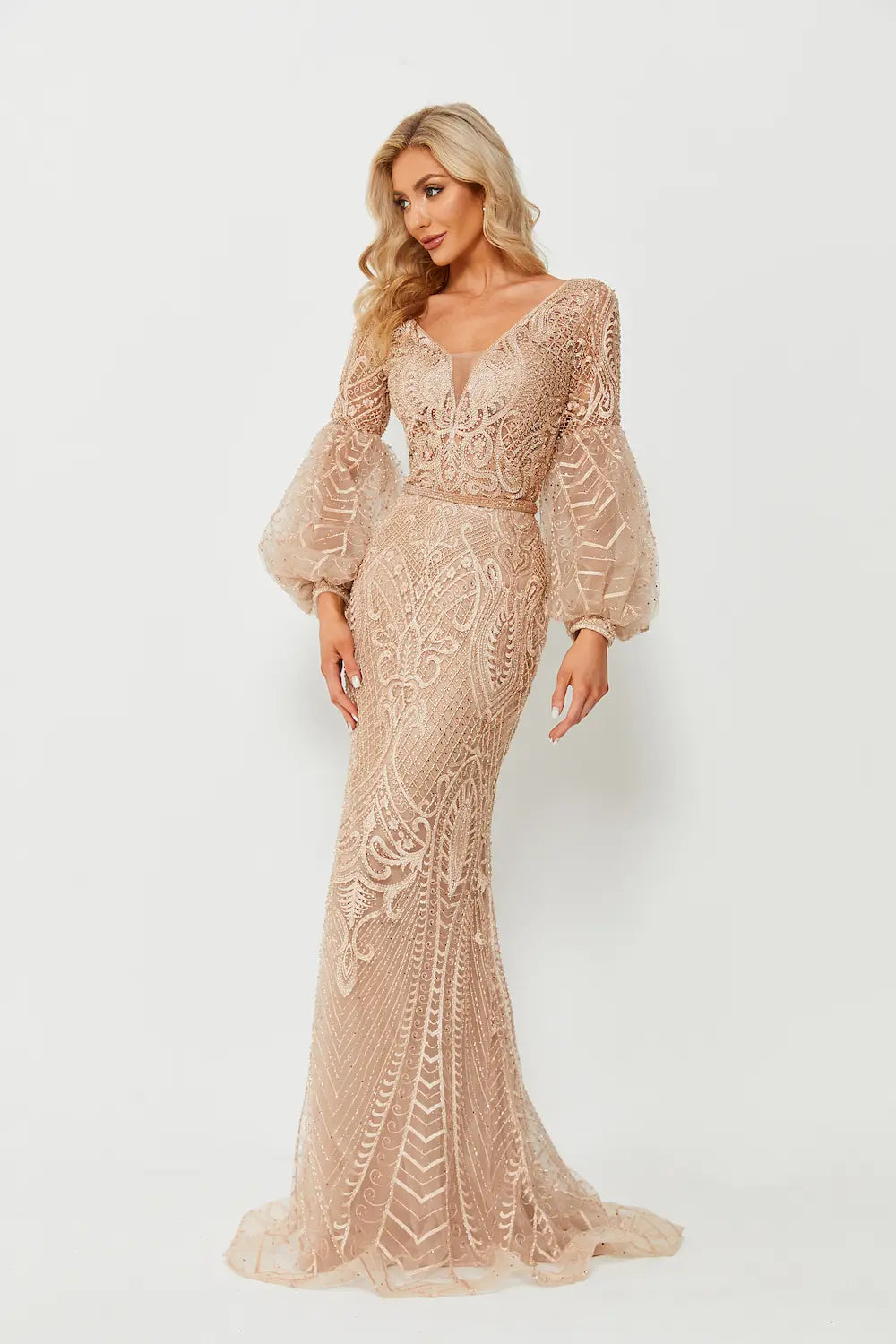Champagne beaded A-line gown with long puff sleeves and textured fitted bodice