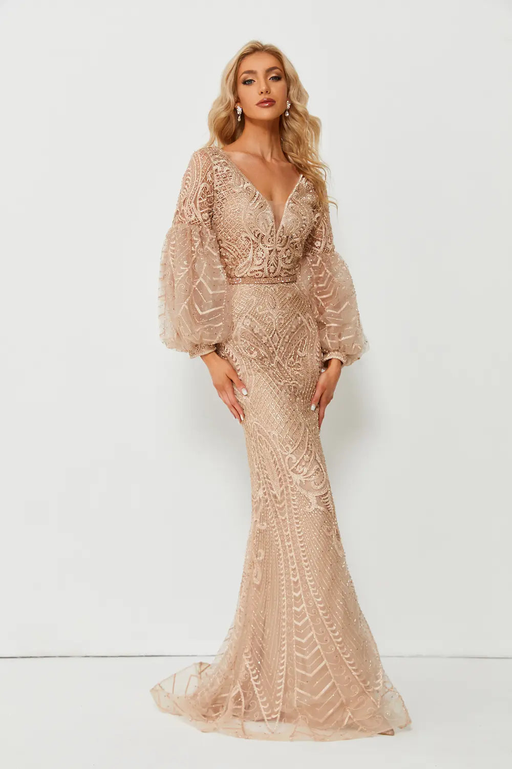 Champagne beaded A-line gown with long puff sleeves and V neckline