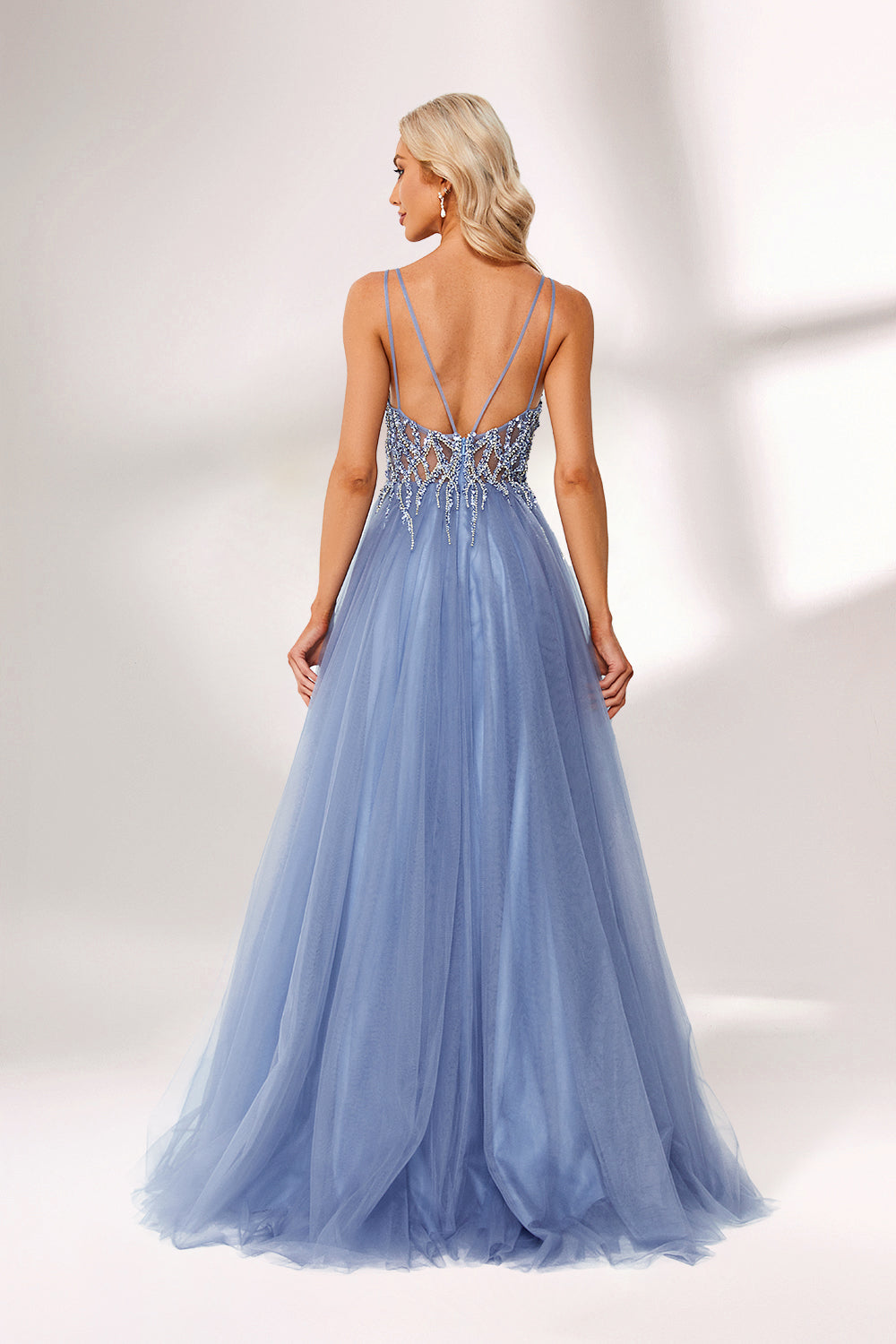Light blue tulle prom dress with beaded bodice, double straps, slit detail & ball gown skirt. Elegant and eye-catching—ideal for bulk premium formalwear stock.02