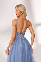Light blue tulle prom dress with beaded bodice, double straps, slit detail & ball gown skirt. Elegant and eye-catching—ideal for bulk premium formalwear stock.04