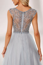 Silver gray tulle prom dress with beaded bodice, illusion back & cap sleeves. V-neck ball gown design adds elegance. Great for formal events & bulk buys.03