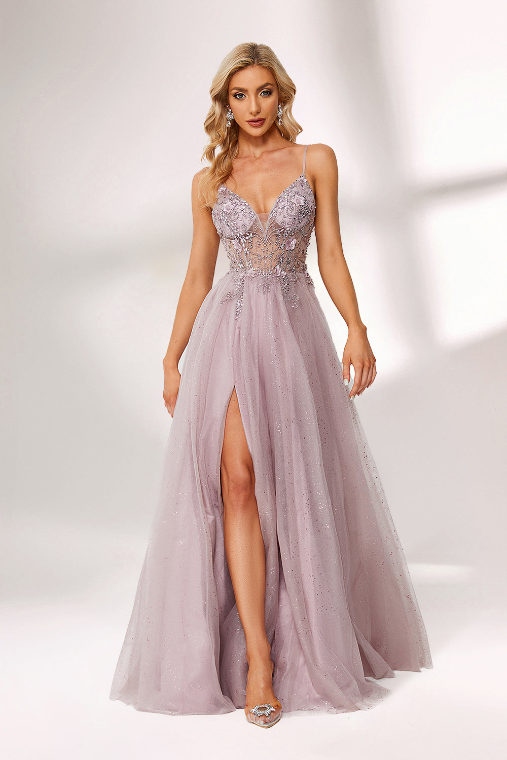 Lilac tulle prom dress with beaded sheer bodice, high slit, plunge neckline, and A-line skirt. Romantic, flattering design perfect for formal events and bulk orders.03