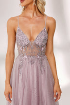 Lilac tulle prom dress with beaded sheer bodice, high slit, plunge neckline, and A-line skirt. Romantic, flattering design perfect for formal events and bulk orders.05