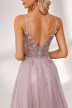 Lilac tulle prom dress with beaded sheer bodice, high slit, plunge neckline, and A-line skirt. Romantic, flattering design perfect for formal events and bulk orders.04