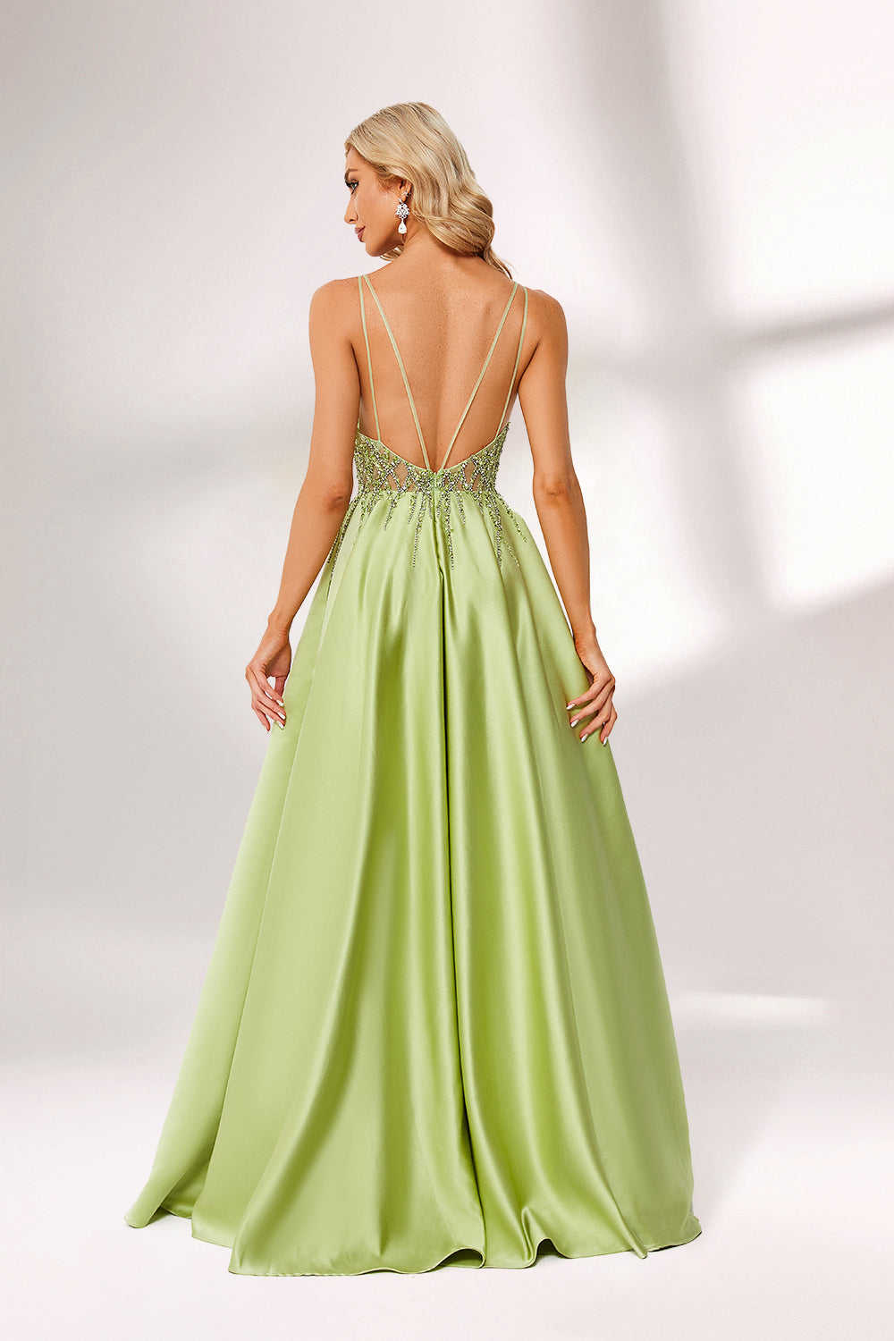 Lime green satin prom dress with beaded sheer bodice, backless design & double straps. Bold ball gown—perfect for bulk orders in standout formalwear collections.02