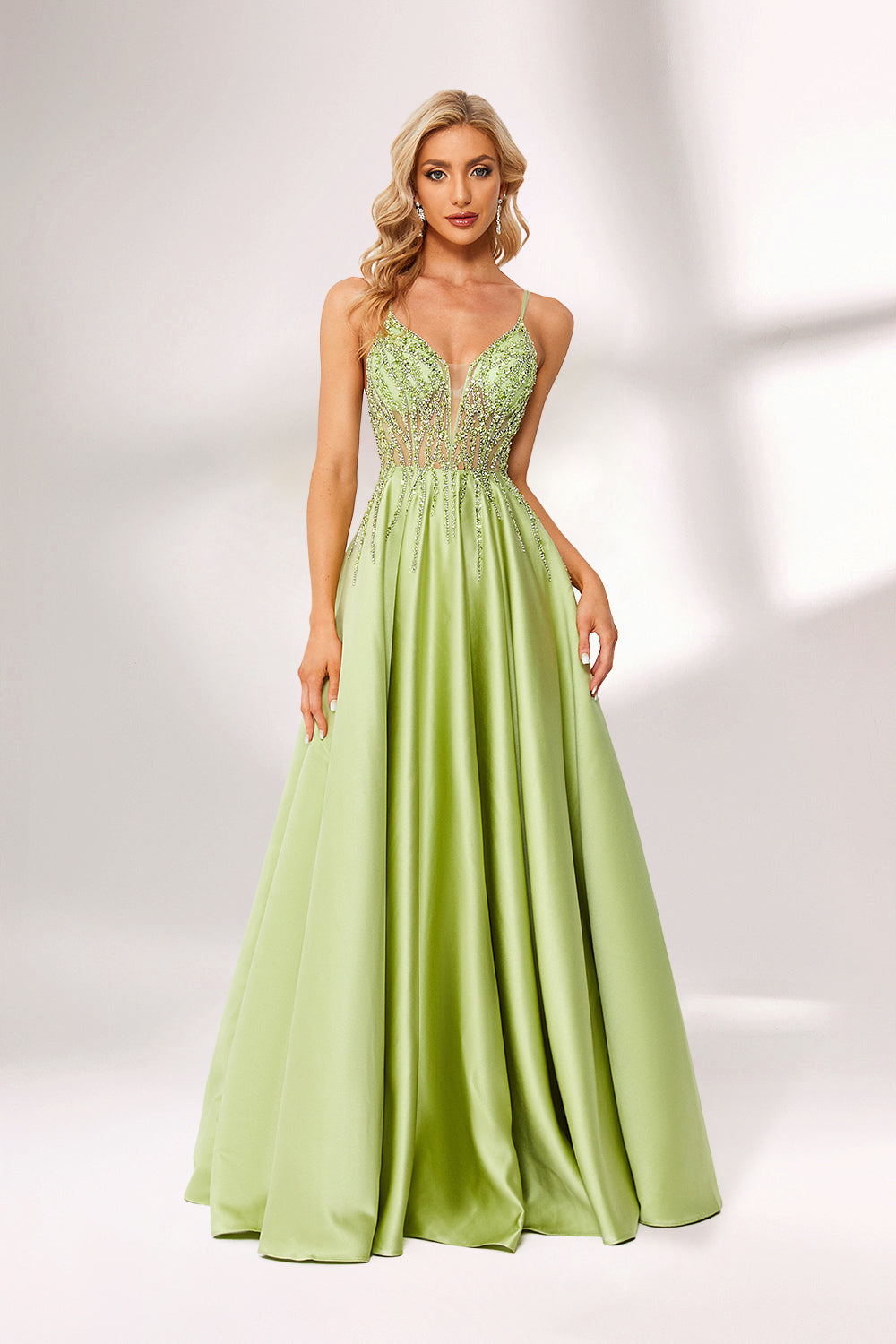 Lime green satin prom dress with beaded sheer bodice, backless design & double straps. Bold ball gown—perfect for bulk orders in standout formalwear collections.04