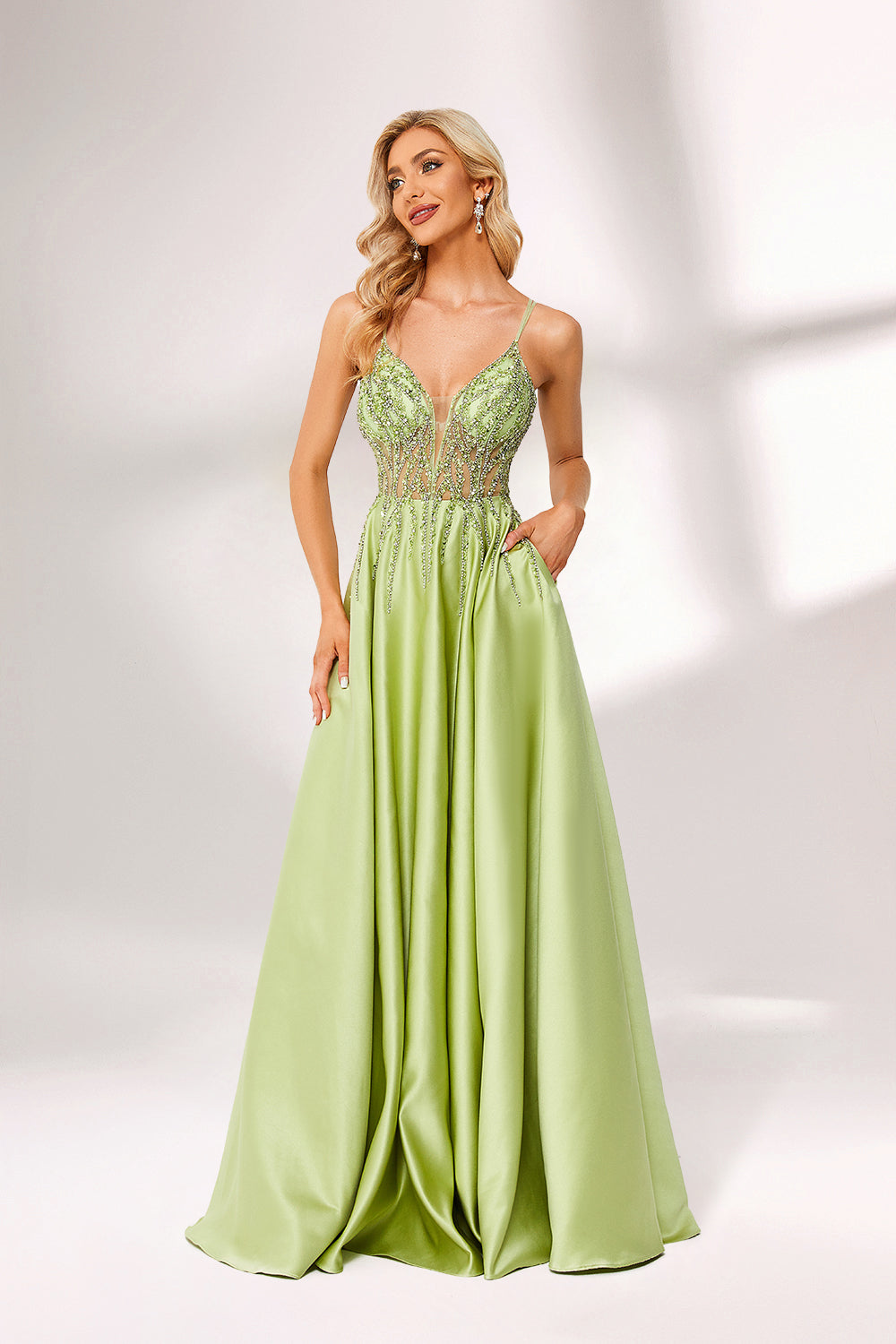 Lime green satin prom dress with beaded sheer bodice, backless design & double straps. Bold ball gown—perfect for bulk orders in standout formalwear collections.03