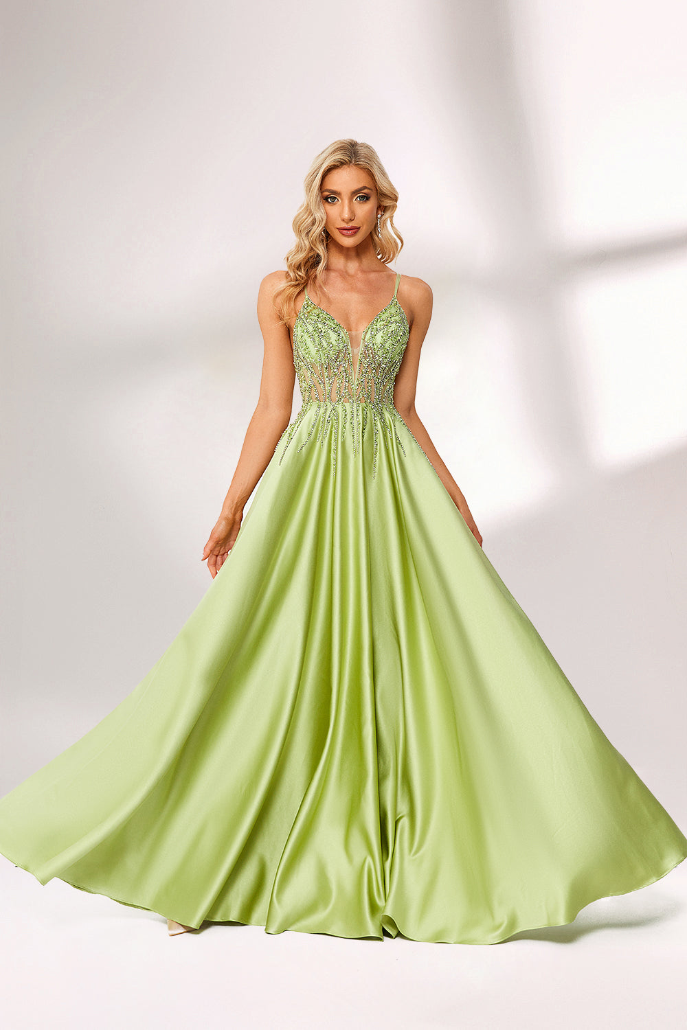 Lime green satin prom dress with beaded sheer bodice, backless design & double straps. Bold ball gown—perfect for bulk orders in standout formalwear collections.01