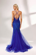 Bathed in soft light, a woman dazzles in a royal - blue sequined mermaid gown. It features thin straps, a deep V - neckline, and a flowing tulle skirt. The shimmering sequins lend an air of opulence, perfect for grand galas or red - carpet moments.2