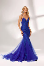 Bathed in soft light, a woman dazzles in a royal - blue sequined mermaid gown. It features thin straps, a deep V - neckline, and a flowing tulle skirt. The shimmering sequins lend an air of opulence, perfect for grand galas or red - carpet moments.4