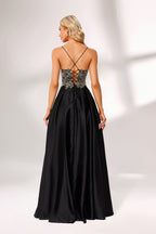 A woman stands against a light background, wearing a black satin gown. The bodice features intricate silver bead embroidery, a deep V - neckline, and thin straps. The voluminous skirt adds elegance, perfect for formal events like galas or weddings, exuding sophistication.3