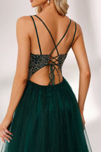 Dark green tulle prom dress with gold lace bodice, criss-cross back, plunge neckline, and A-line skirt. Elegant and chic, ideal for bulk orders and formal events.05