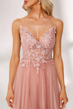 A woman stands against a light background, wearing a pink tulle gown. It has thin straps, a deep V - neckline, and a voluminous skirt. The bodice features delicate floral lace embroidery, combining romance and elegance. Perfect for formal events like weddings or proms, it exudes charm.3