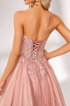 Blush pink tulle prom dress with strapless lace bodice, corset back, floral embroidery, and ball gown silhouette—ideal for bulk elegant formal collections.05