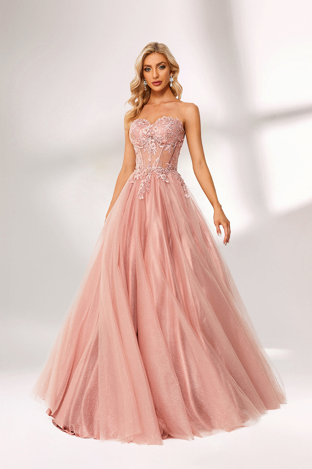 Blush pink tulle prom dress with strapless lace bodice, corset back, floral embroidery, and ball gown silhouette—ideal for bulk elegant formal collections.01