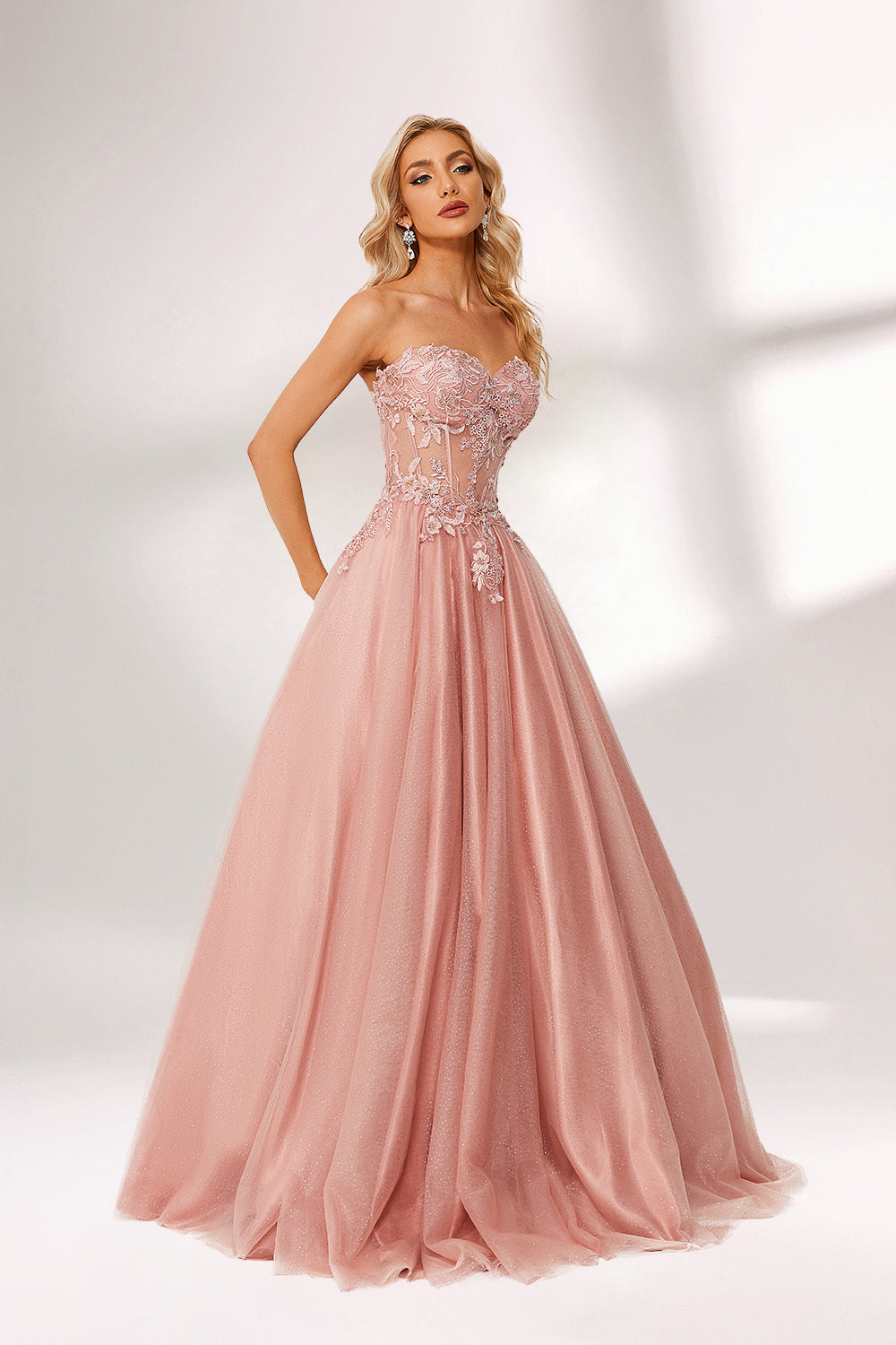 Blush pink tulle prom dress with strapless lace bodice, corset back, floral embroidery, and ball gown silhouette—ideal for bulk elegant formal collections.04