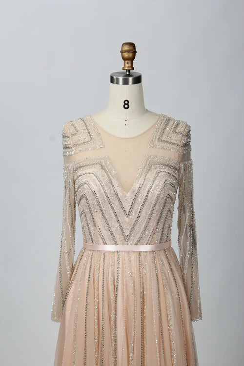 Beaded V-neck champagne A-line dress with long sleeves and pleated skirt