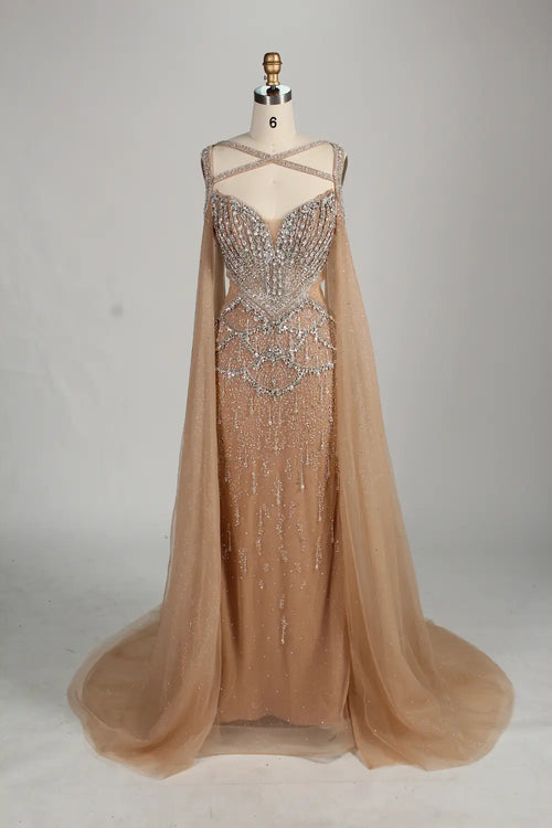 Front view: beaded halter champagne mermaid gown with draped sleeve capes