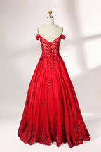 Photograph of an elegant, off-the-shoulder red ball gown on a white dress form. The dress features intricate, sparkling beadwork on the bodice and a voluminous, flowing skirt adorned with delicate floral patterns. The background is a plain white studio setup with soft shadows, emphasizing the dress's vibrant color and luxurious texture.02