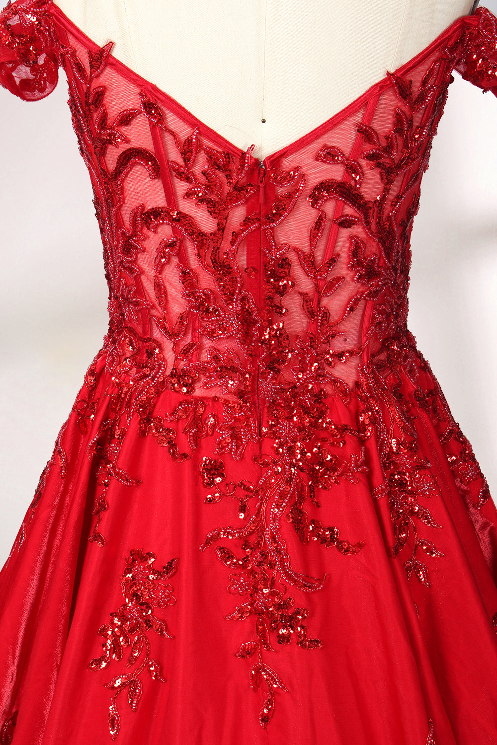 Photograph of an elegant, off-the-shoulder red ball gown on a white dress form. The dress features intricate, sparkling beadwork on the bodice and a voluminous, flowing skirt adorned with delicate floral patterns. The background is a plain white studio setup with soft shadows, emphasizing the dress's vibrant color and luxurious texture.05
