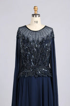 Navy A-line chiffon dress with beadwork boat neckline and long cape sleeves
